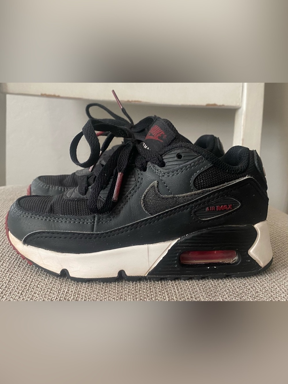 Nike Kids Black Sneakers with Red Accents
